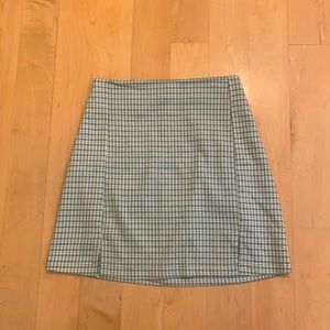 Brandy Melville green mini skirt.
